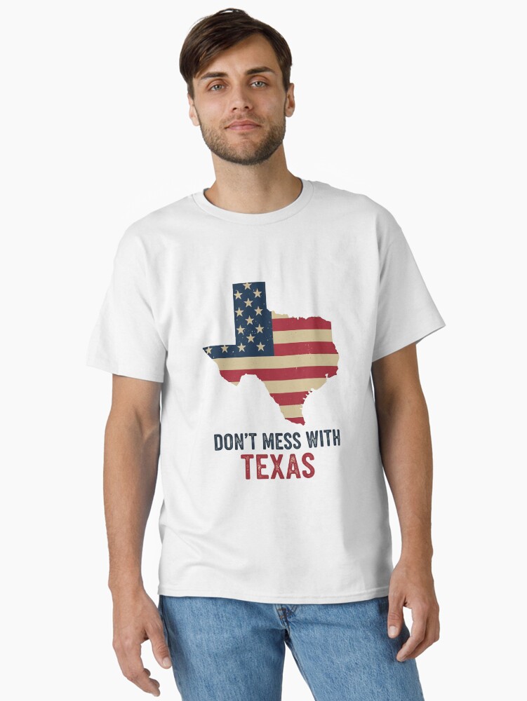 “Distressed Texas state outline t-shirt with rustic American flag and bold ‘Don’t Mess With Texas’ text – retro patriotic design”