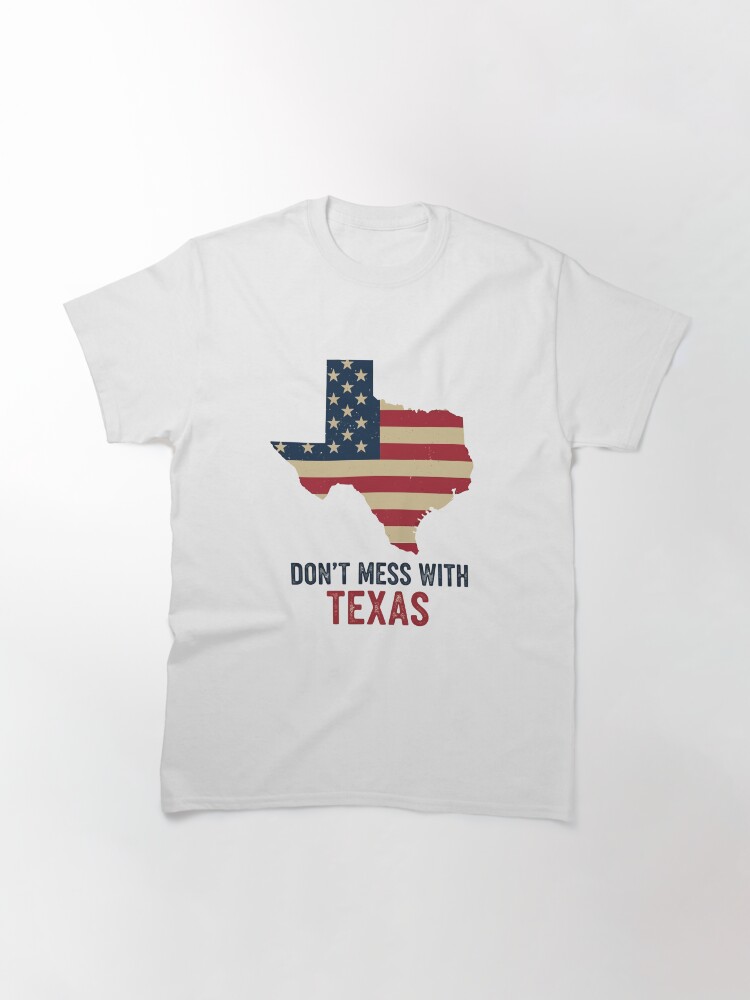 “Distressed Texas state outline t-shirt with rustic American flag and bold ‘Don’t Mess With Texas’ text – retro patriotic design”
